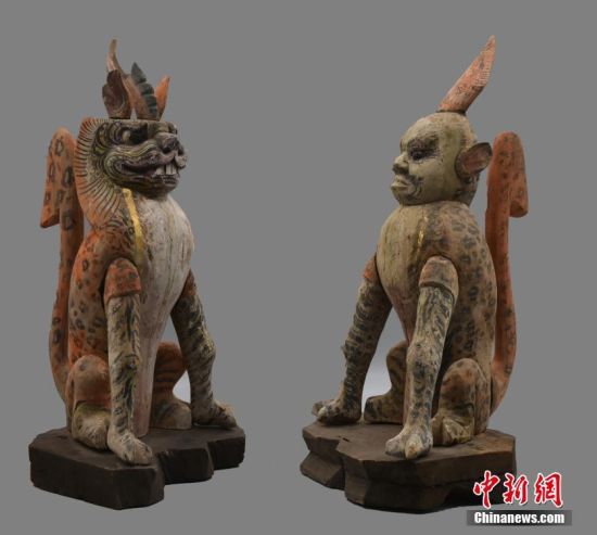 圖為慕容智墓出土鎮(zhèn)墓獸。 中新社發(fā) 甘肅省文物局 供圖